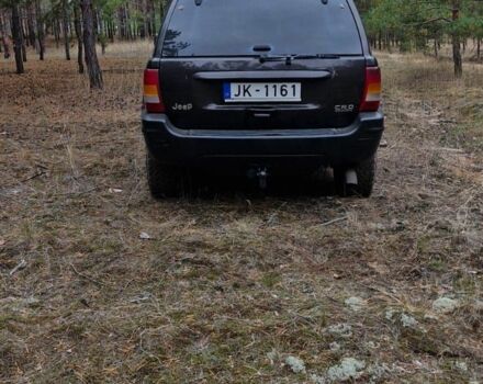 Черный Джип Гранд Чероки, объемом двигателя 2.7 л и пробегом 300 тыс. км за 5800 $, фото 2 на Automoto.ua