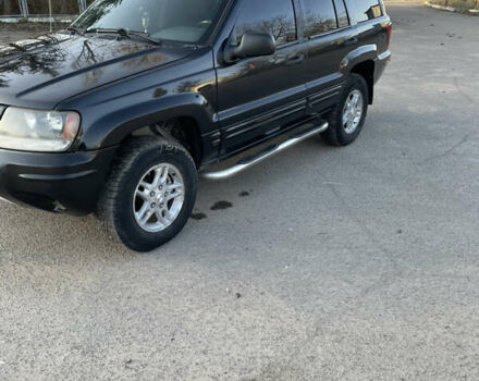 Чорний Джип Grand Cherokee, об'ємом двигуна 4 л та пробігом 120 тис. км за 5900 $, фото 19 на Automoto.ua