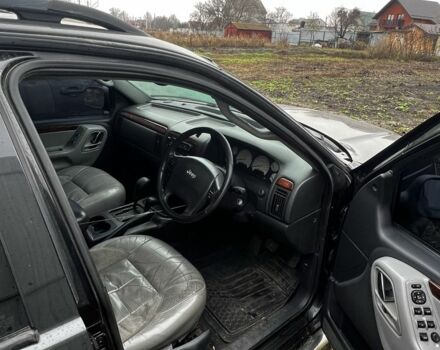 Черный Джип Гранд Чероки, объемом двигателя 2.7 л и пробегом 300 тыс. км за 2837 $, фото 4 на Automoto.ua