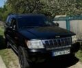 Черный Джип Гранд Чероки, объемом двигателя 2.7 л и пробегом 500 тыс. км за 7500 $, фото 1 на Automoto.ua