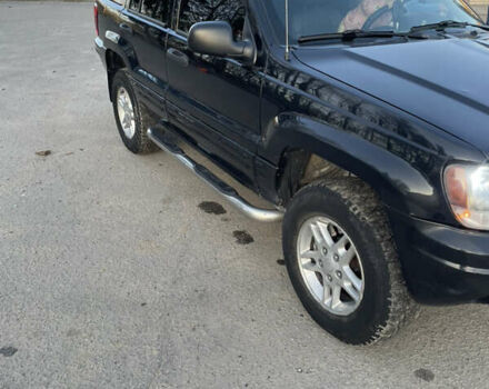 Чорний Джип Grand Cherokee, об'ємом двигуна 4 л та пробігом 120 тис. км за 5900 $, фото 28 на Automoto.ua
