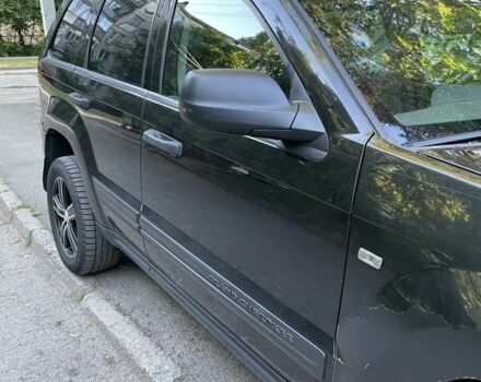Чорний Джип Grand Cherokee, об'ємом двигуна 3 л та пробігом 362 тис. км за 9000 $, фото 1 на Automoto.ua