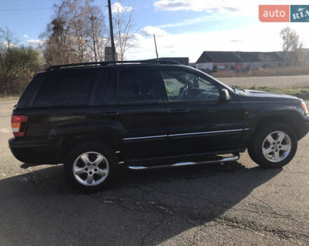 Черный Джип Гранд Чероки, объемом двигателя 2.7 л и пробегом 280 тыс. км за 4999 $, фото 6 на Automoto.ua