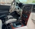 Черный Джип Гранд Чероки, объемом двигателя 5.7 л и пробегом 180 тыс. км за 12500 $, фото 21 на Automoto.ua