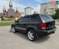 Черный Джип Гранд Чероки, объемом двигателя 5.7 л и пробегом 180 тыс. км за 12500 $, фото 4 на Automoto.ua