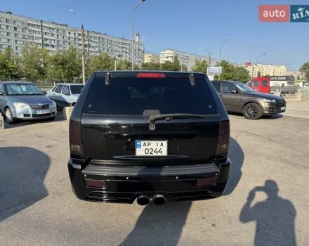 Черный Джип Гранд Чероки, объемом двигателя 6.06 л и пробегом 129 тыс. км за 27000 $, фото 4 на Automoto.ua