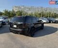 Черный Джип Гранд Чероки, объемом двигателя 6.06 л и пробегом 129 тыс. км за 27000 $, фото 5 на Automoto.ua
