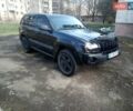 Черный Джип Гранд Чероки, объемом двигателя 3.7 л и пробегом 300 тыс. км за 10400 $, фото 1 на Automoto.ua