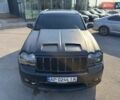 Черный Джип Гранд Чероки, объемом двигателя 6.06 л и пробегом 129 тыс. км за 27000 $, фото 15 на Automoto.ua