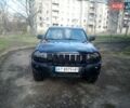 Черный Джип Гранд Чероки, объемом двигателя 3.7 л и пробегом 300 тыс. км за 10400 $, фото 1 на Automoto.ua