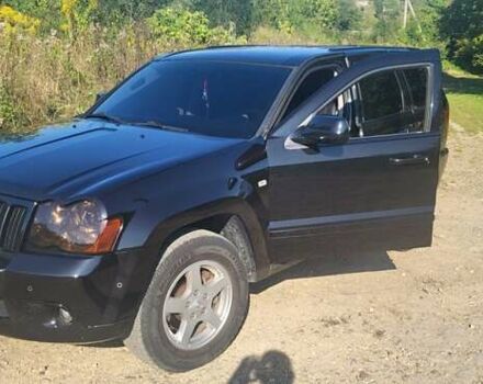 Чорний Джип Grand Cherokee, об'ємом двигуна 5.7 л та пробігом 300 тис. км за 13700 $, фото 2 на Automoto.ua
