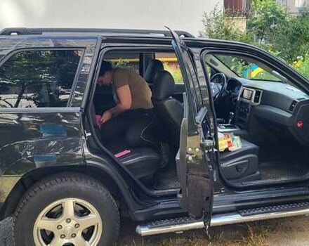 Чорний Джип Grand Cherokee, об'ємом двигуна 2.99 л та пробігом 334 тис. км за 11000 $, фото 1 на Automoto.ua