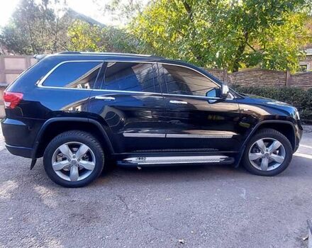 Черный Джип Гранд Чероки, объемом двигателя 2.99 л и пробегом 92 тыс. км за 20000 $, фото 7 на Automoto.ua