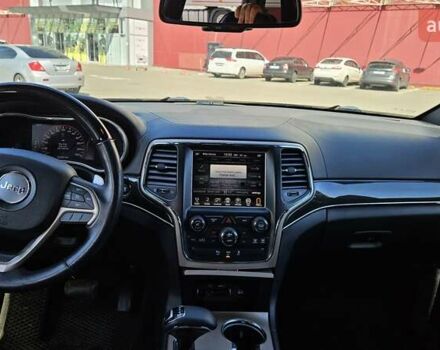 Черный Джип Гранд Чероки, объемом двигателя 5.65 л и пробегом 180 тыс. км за 22500 $, фото 23 на Automoto.ua