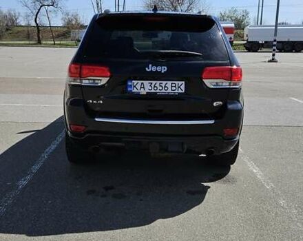 Черный Джип Гранд Чероки, объемом двигателя 5.65 л и пробегом 180 тыс. км за 22500 $, фото 3 на Automoto.ua
