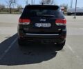 Черный Джип Гранд Чероки, объемом двигателя 5.65 л и пробегом 180 тыс. км за 22500 $, фото 3 на Automoto.ua