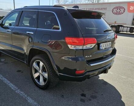 Черный Джип Гранд Чероки, объемом двигателя 5.65 л и пробегом 180 тыс. км за 22500 $, фото 9 на Automoto.ua