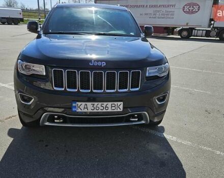 Черный Джип Гранд Чероки, объемом двигателя 5.65 л и пробегом 180 тыс. км за 22500 $, фото 2 на Automoto.ua