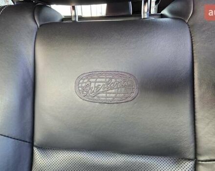 Черный Джип Гранд Чероки, объемом двигателя 5.65 л и пробегом 180 тыс. км за 22500 $, фото 13 на Automoto.ua