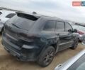 Черный Джип Гранд Чероки, объемом двигателя 6.4 л и пробегом 51 тыс. км за 2800 $, фото 2 на Automoto.ua