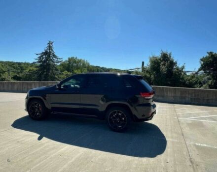 Черный Джип Гранд Чероки, объемом двигателя 6.4 л и пробегом 77 тыс. км за 1000 $, фото 2 на Automoto.ua