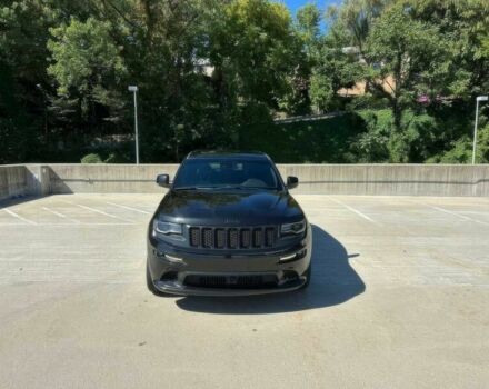 Черный Джип Гранд Чероки, объемом двигателя 6.4 л и пробегом 77 тыс. км за 1000 $, фото 1 на Automoto.ua