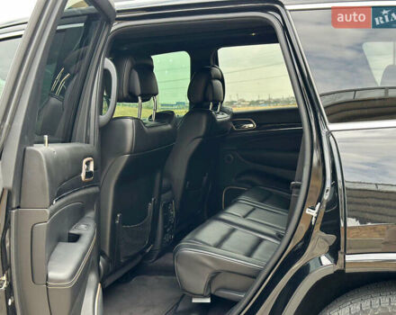 Чорний Джип Grand Cherokee, об'ємом двигуна 5.65 л та пробігом 250 тис. км за 19000 $, фото 10 на Automoto.ua