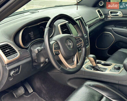 Чорний Джип Grand Cherokee, об'ємом двигуна 5.65 л та пробігом 250 тис. км за 19000 $, фото 5 на Automoto.ua