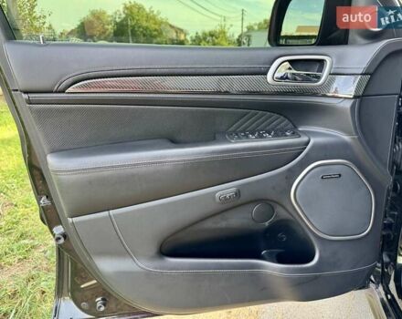 Чорний Джип Grand Cherokee, об'ємом двигуна 6.4 л та пробігом 131 тис. км за 34999 $, фото 24 на Automoto.ua