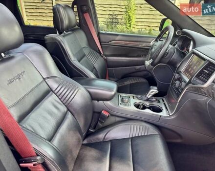 Чорний Джип Grand Cherokee, об'ємом двигуна 6.4 л та пробігом 131 тис. км за 34999 $, фото 47 на Automoto.ua