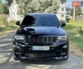 Чорний Джип Grand Cherokee, об'ємом двигуна 6.4 л та пробігом 131 тис. км за 34999 $, фото 1 на Automoto.ua