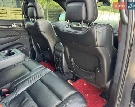 Чорний Джип Grand Cherokee, об'ємом двигуна 6.4 л та пробігом 131 тис. км за 34999 $, фото 52 на Automoto.ua