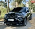 Чорний Джип Grand Cherokee, об'ємом двигуна 6.42 л та пробігом 120 тис. км за 35500 $, фото 1 на Automoto.ua