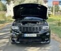 Чорний Джип Grand Cherokee, об'ємом двигуна 6.4 л та пробігом 131 тис. км за 34999 $, фото 9 на Automoto.ua