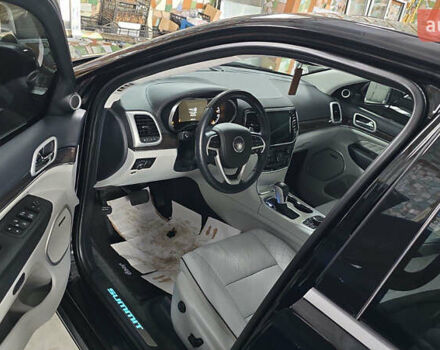 Черный Джип Гранд Чероки, объемом двигателя 5.65 л и пробегом 86 тыс. км за 35000 $, фото 24 на Automoto.ua