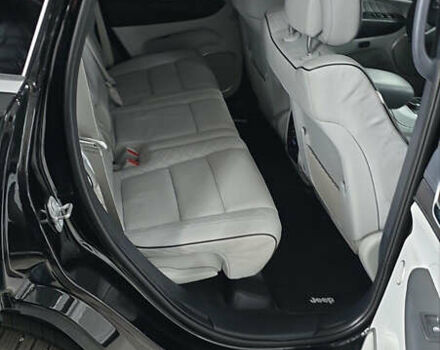 Черный Джип Гранд Чероки, объемом двигателя 5.65 л и пробегом 86 тыс. км за 35000 $, фото 25 на Automoto.ua