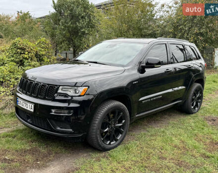 Черный Джип Гранд Чероки, объемом двигателя 5.65 л и пробегом 86 тыс. км за 35000 $, фото 11 на Automoto.ua