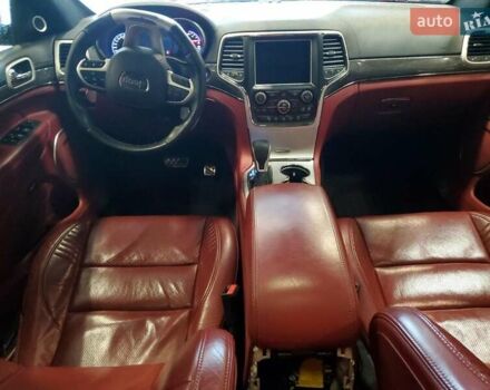 Черный Джип Гранд Чероки, объемом двигателя 6.2 л и пробегом 131 тыс. км за 4300 $, фото 7 на Automoto.ua