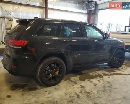 Черный Джип Гранд Чероки, объемом двигателя 6.2 л и пробегом 131 тыс. км за 4300 $, фото 2 на Automoto.ua