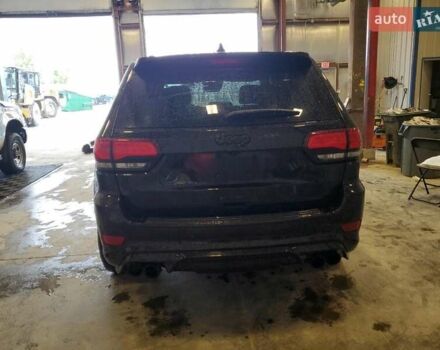 Черный Джип Гранд Чероки, объемом двигателя 6.2 л и пробегом 131 тыс. км за 4300 $, фото 5 на Automoto.ua