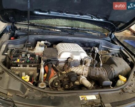 Черный Джип Гранд Чероки, объемом двигателя 6.2 л и пробегом 131 тыс. км за 4300 $, фото 10 на Automoto.ua