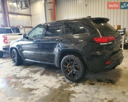 Черный Джип Гранд Чероки, объемом двигателя 6.2 л и пробегом 131 тыс. км за 4300 $, фото 1 на Automoto.ua