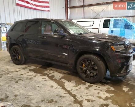 Черный Джип Гранд Чероки, объемом двигателя 6.2 л и пробегом 131 тыс. км за 4300 $, фото 3 на Automoto.ua