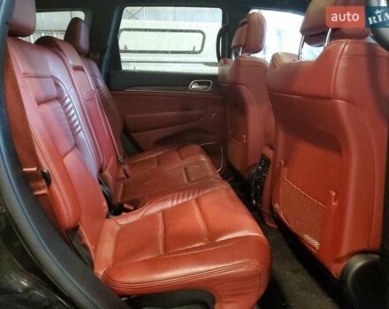 Черный Джип Гранд Чероки, объемом двигателя 6.2 л и пробегом 131 тыс. км за 4300 $, фото 9 на Automoto.ua