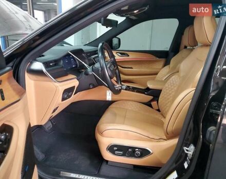 Черный Джип Гранд Чероки, объемом двигателя 5.65 л и пробегом 60 тыс. км за 17800 $, фото 5 на Automoto.ua