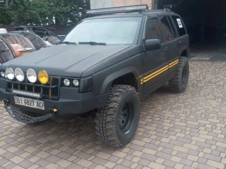 Джип Grand Cherokee 1994 у Полтаві на Automoto.ua Чорний Джип Grand Cherokee, об'ємом двигуна 5.2 л та пробігом 140 тис. км за 7500 $, фото 1 на Automoto.ua