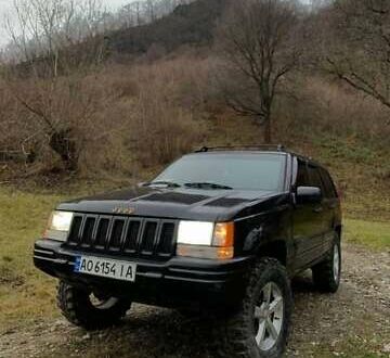 Черный Джип Гранд Чероки, объемом двигателя 5.2 л и пробегом 330 тыс. км за 5900 $, фото 1 на Automoto.ua