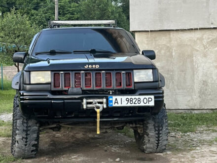 Чорний Джип Grand Cherokee, об'ємом двигуна 3.97 л та пробігом 300 тис. км за 4500 $, фото 1 на Automoto.ua