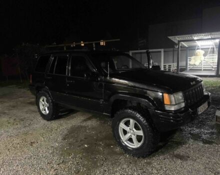 Чорний Джип Grand Cherokee, об'ємом двигуна 5.2 л та пробігом 345 тис. км за 5900 $, фото 1 на Automoto.ua