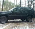 Чорний Джип Grand Cherokee, об'ємом двигуна 4 л та пробігом 150 тис. км за 5000 $, фото 1 на Automoto.ua